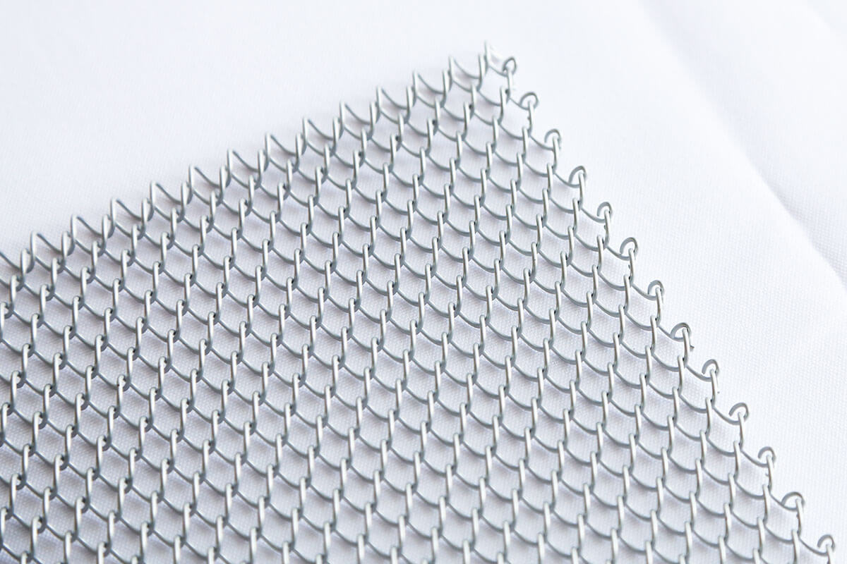 Metal coil drapery